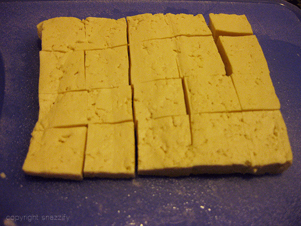 Drain and press tofu