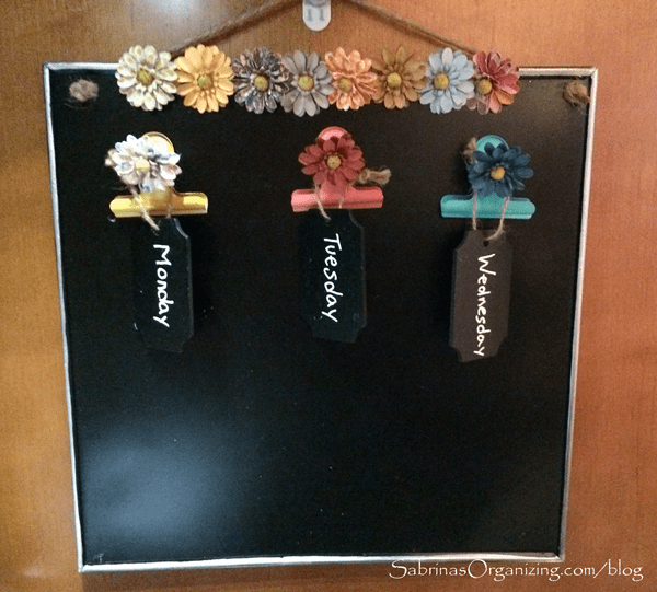 Organizing with clips on a chalkboard