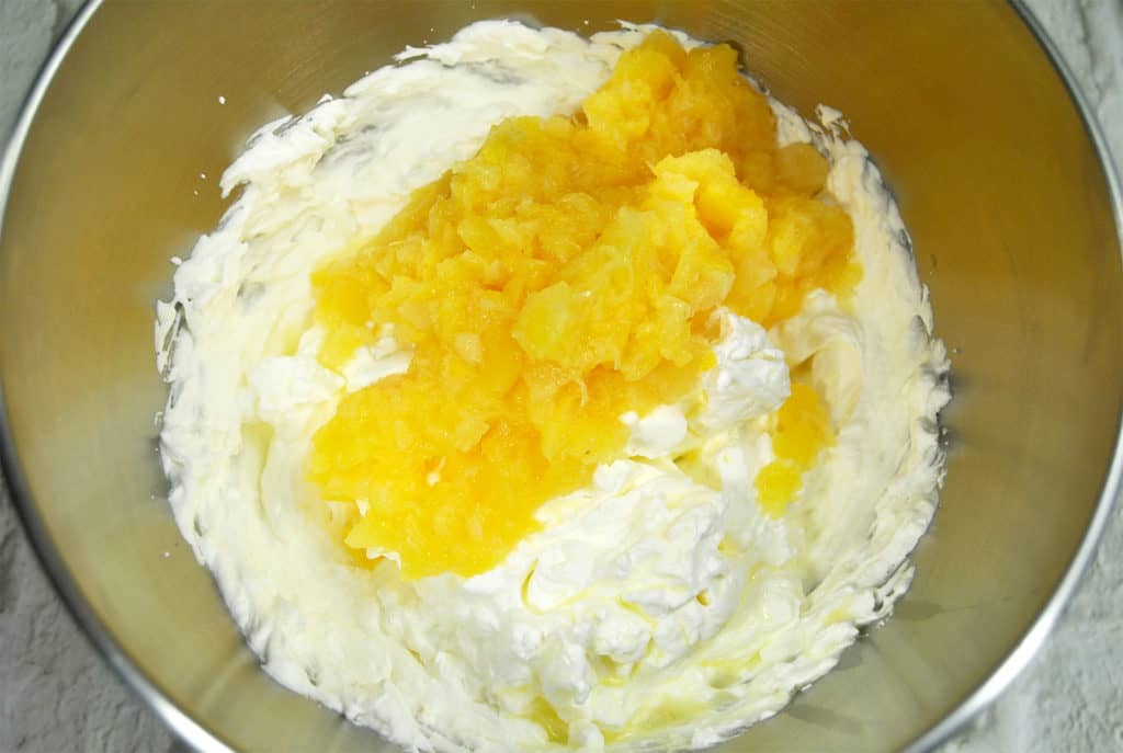 Mixing Cool Whip and pineapple