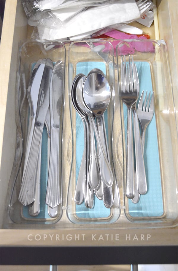 Organizing utensils in a drawer