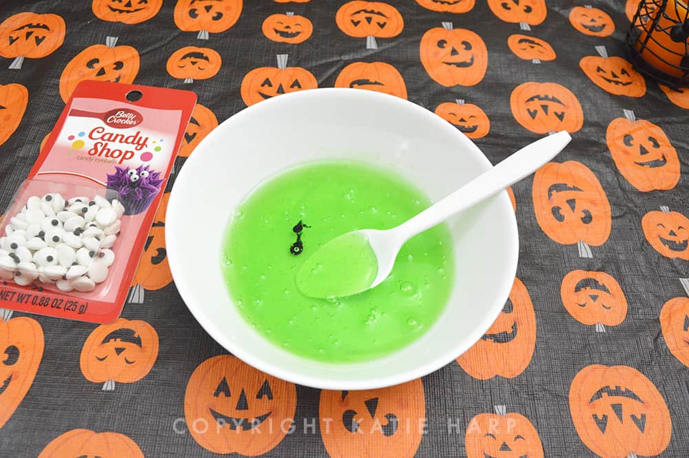 Mixing the green Halloween slime