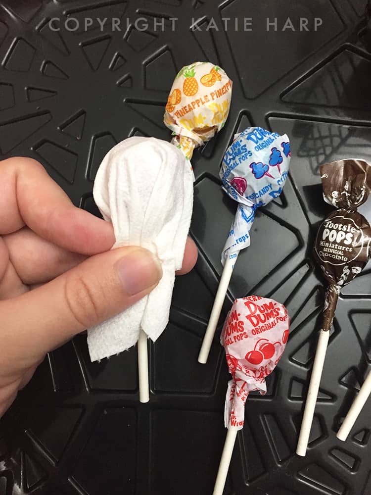 Wrapping a tissue around a lollipop
