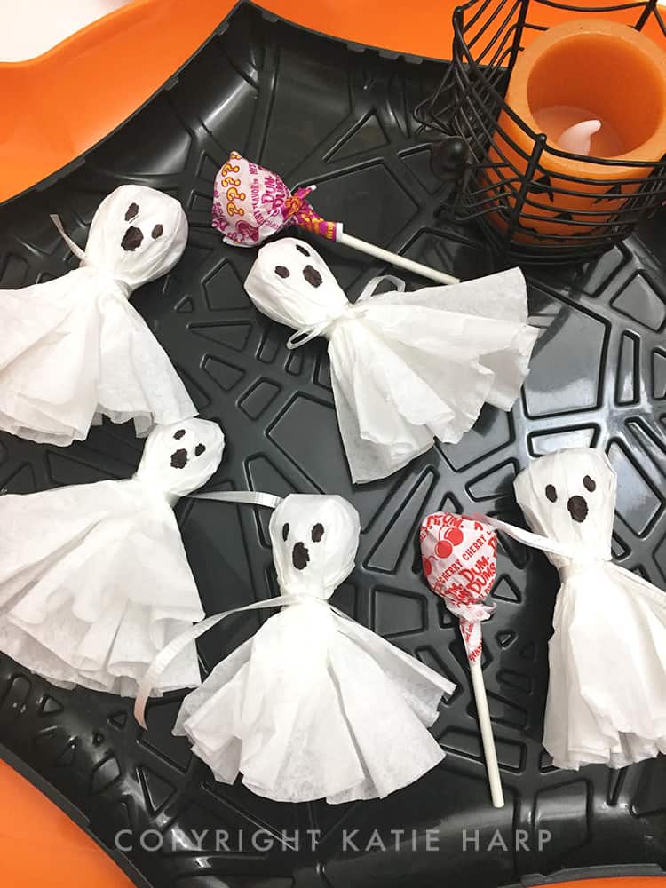 The ghost lollipops on a cobweb plate