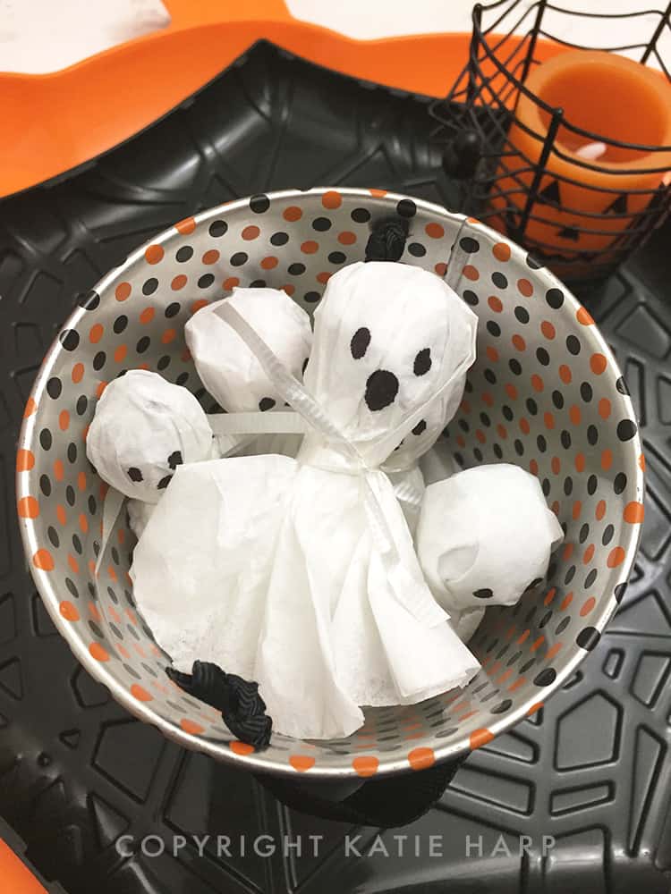 A bucket full of ghost lollipops