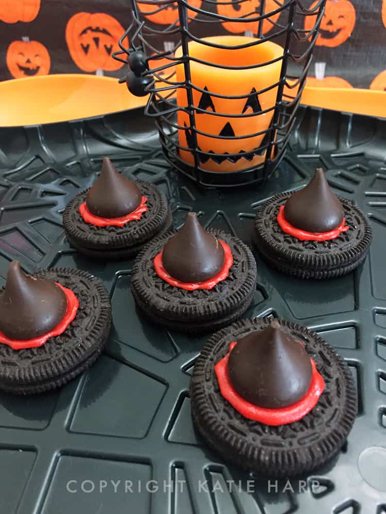 A plate of chocolate cookie witch hats