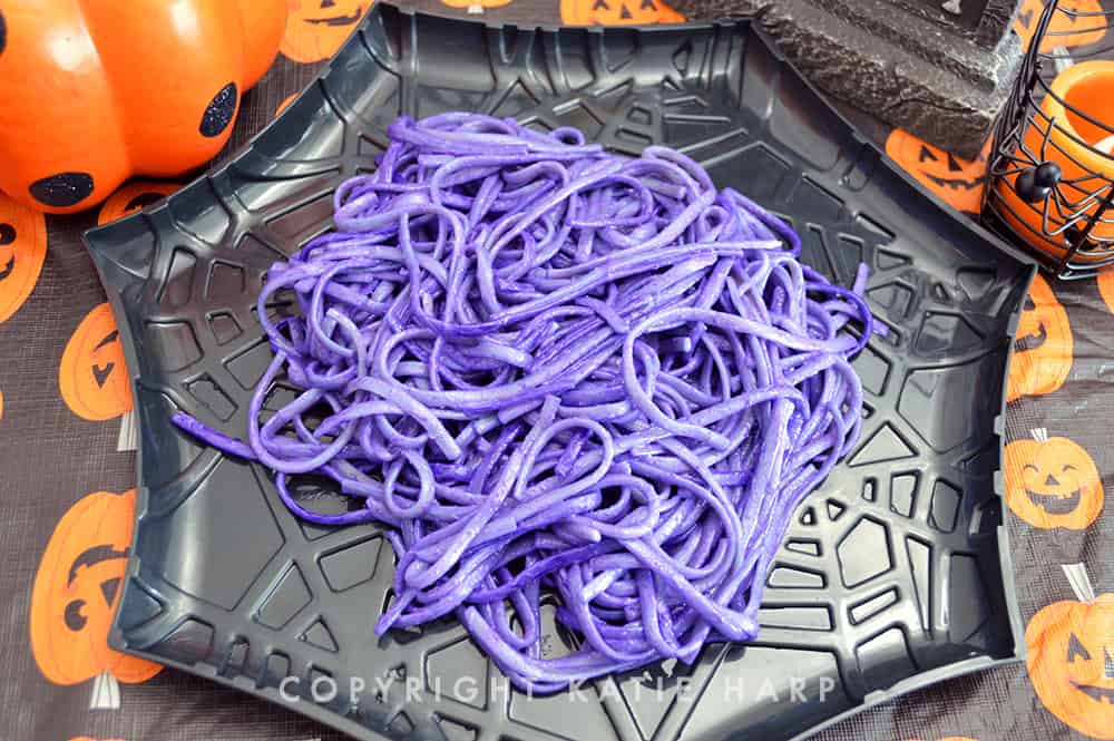 A plate of purple pasta