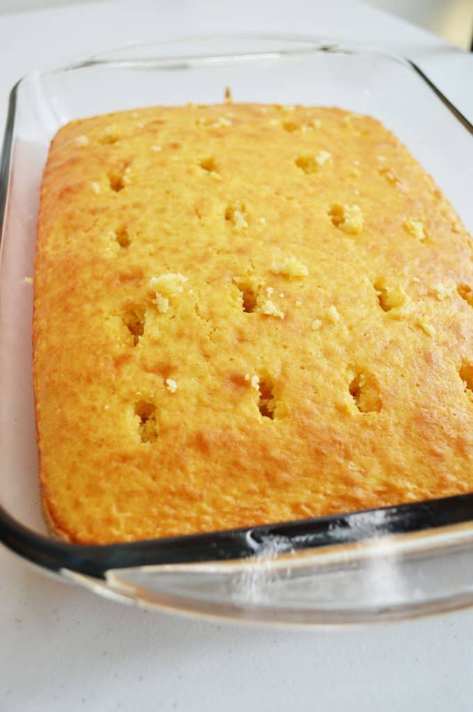 Holes poked into the baked cake