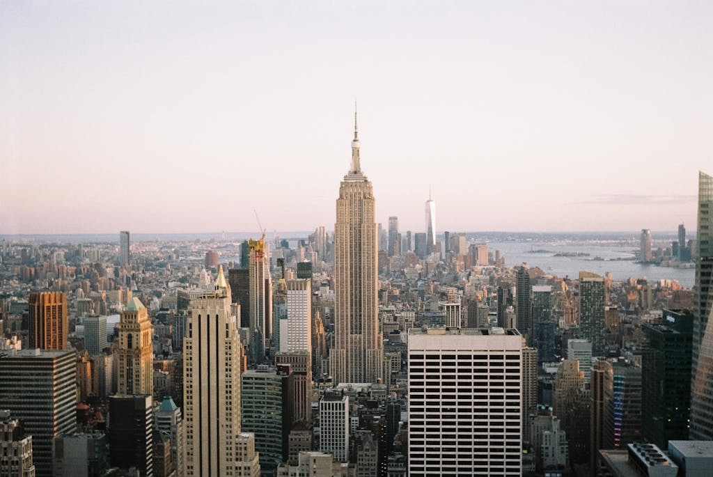 A breathtaking view of New York City with the Empire State Building at dusk.
